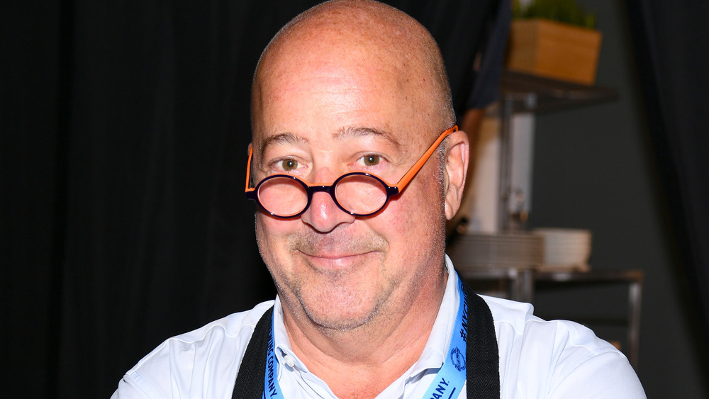 Andrew Zimmern smiling at event