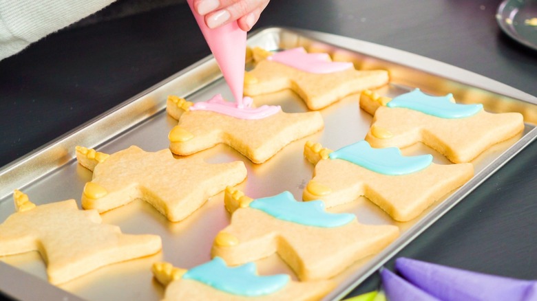 Sugar cookies being iced