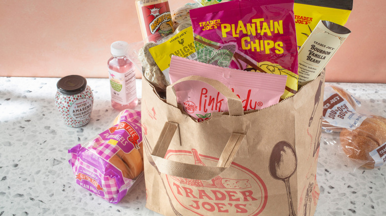 groceries on counter and in a trader joe's bag