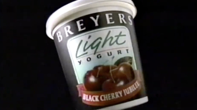 Breyers Light Black Cherry yogurt with black background