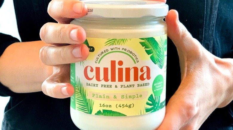 Hands holding Culina Plain & Simple Yogurt