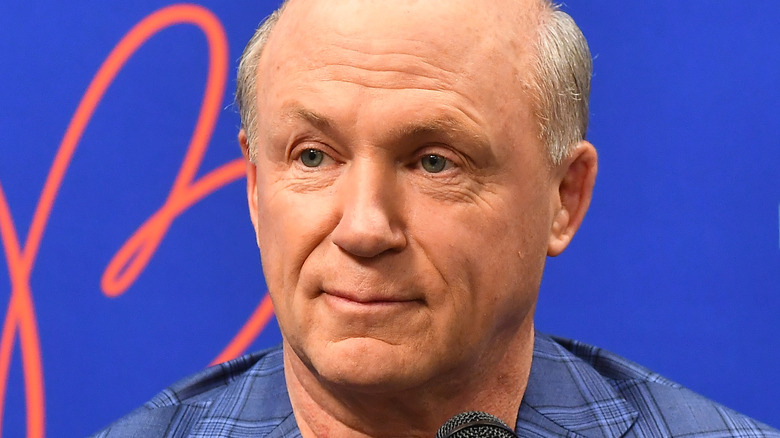 Dan Cathy listening at microphone