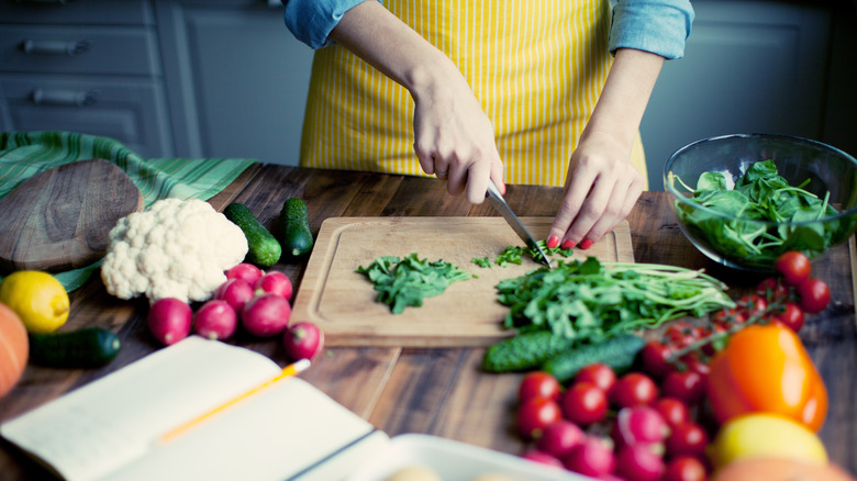 Person chopping vegetables