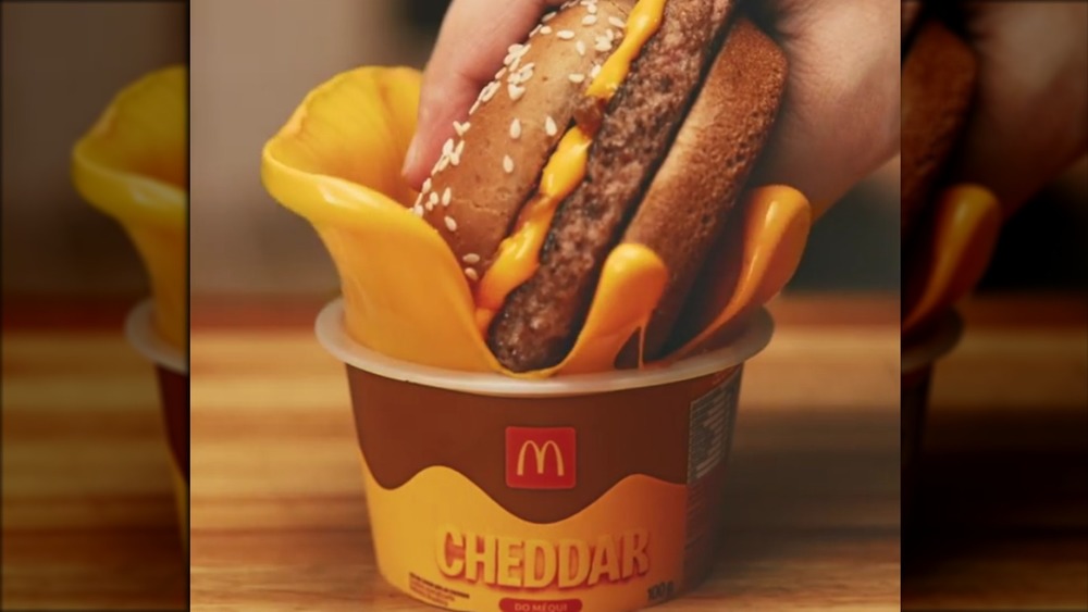 McDonald's burger dunked in cheese