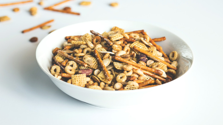 Chex Mix in white bowl