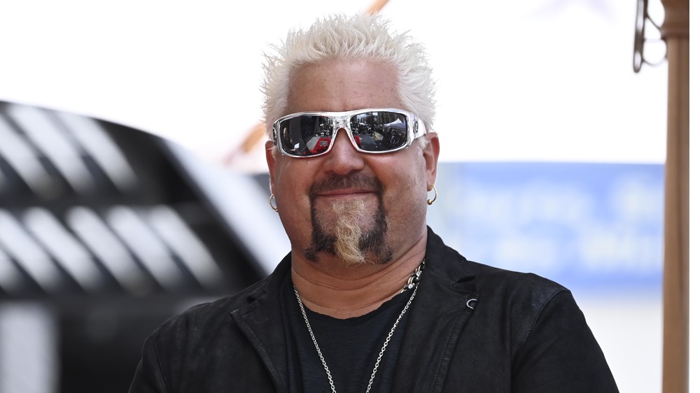 Guy Fieri in silver sunglasses
