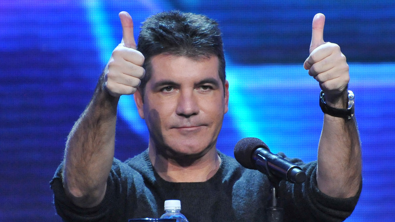 Simon Cowell's thumbs up