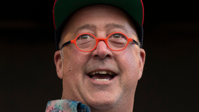 Andrew Zimmern smiling