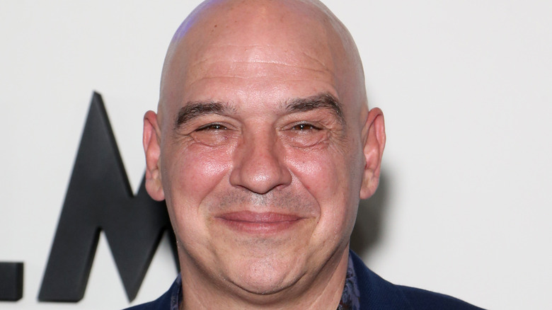 Michael Symon smiling at event