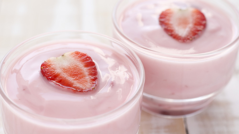 Yogurt with heart-shaped strawberry