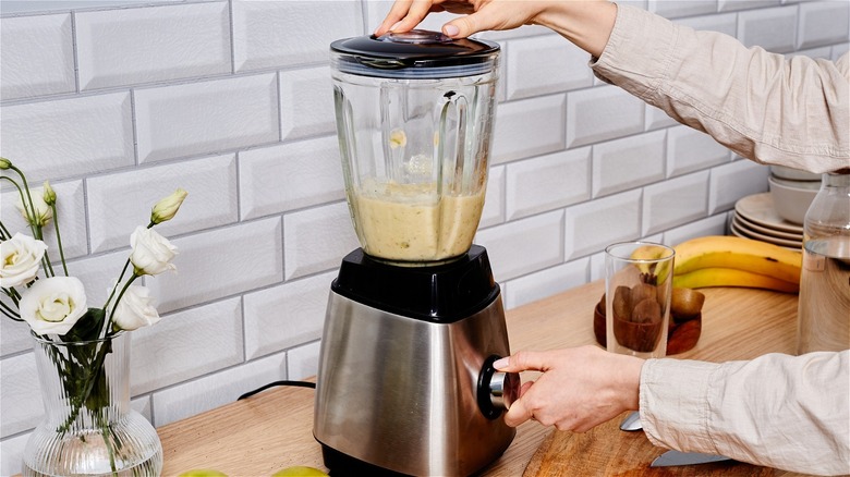 woman using a blender