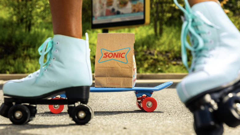 Sonic employee skates and bag