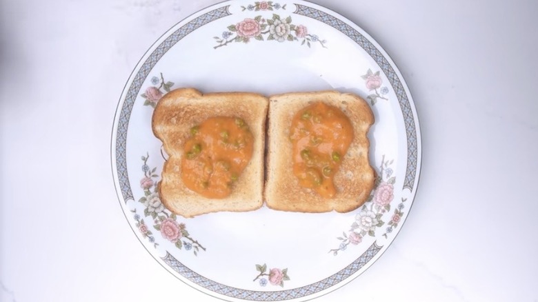 Floral plate with tomato and egg toast