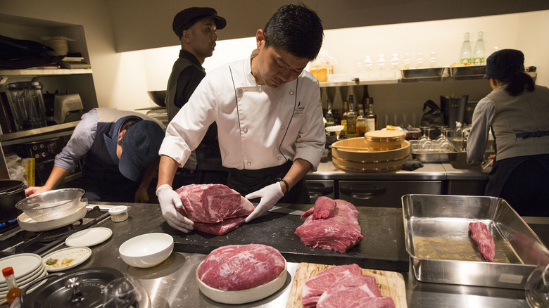 Noriaki Numamoto preparing Wagyu beef