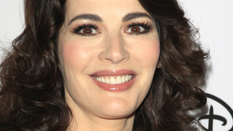 Nigella Lawson with hair down and wide smile