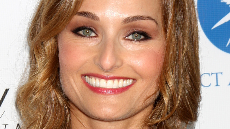 Giada de Laurentiis with hair down and wide smile