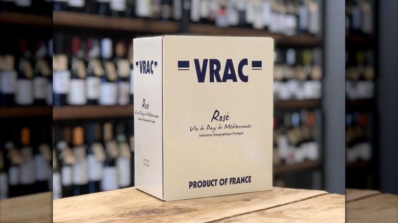Box of Vrac Vin de Pays de Méditerranée Rosé on liquor store counter.
