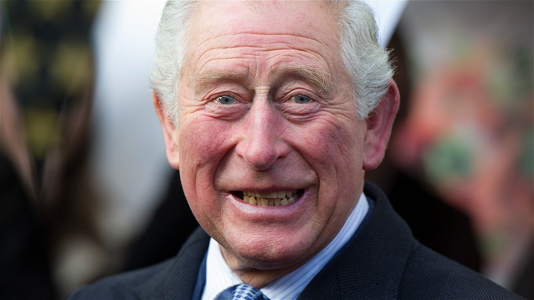 King Charles III smiling