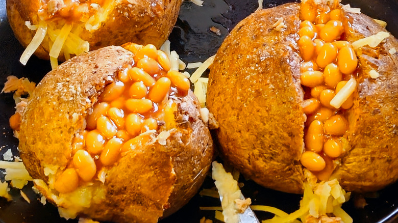 Baked potatoes stuffed with beans.