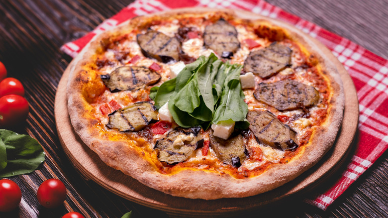 Pizza on wooden table