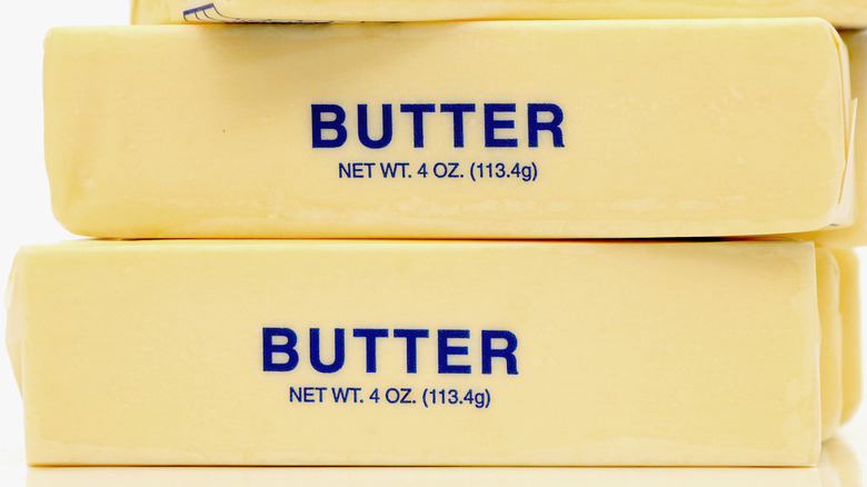 Sticks of wrapped butter