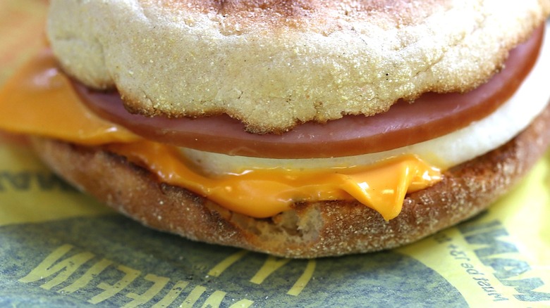 A McDonald's egg McMuffin sits on its wrapper