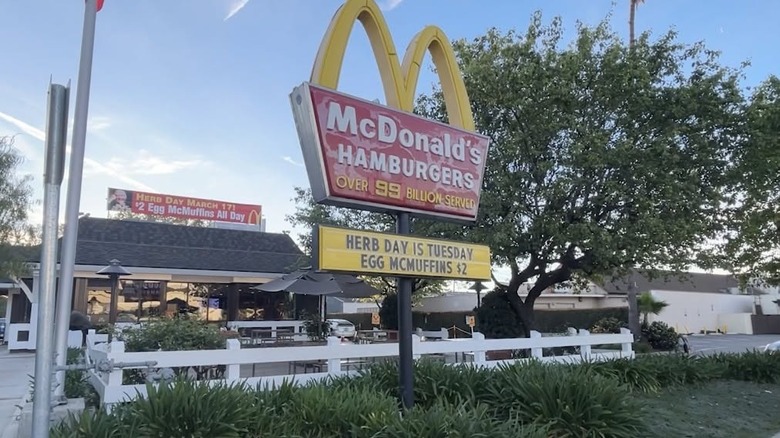 Exterior of a McDonald's in Santa Barbara, CA with sign that mentions Herb Day