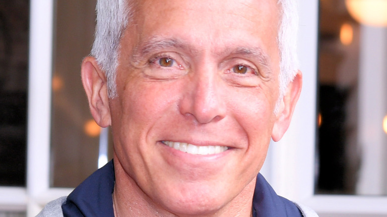 Geoffrey Zakarian smiles in close-up