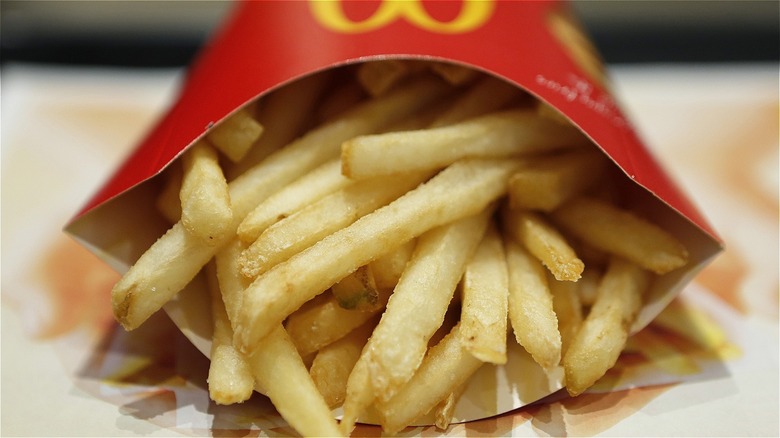 Fries falling out of McDonald's carton