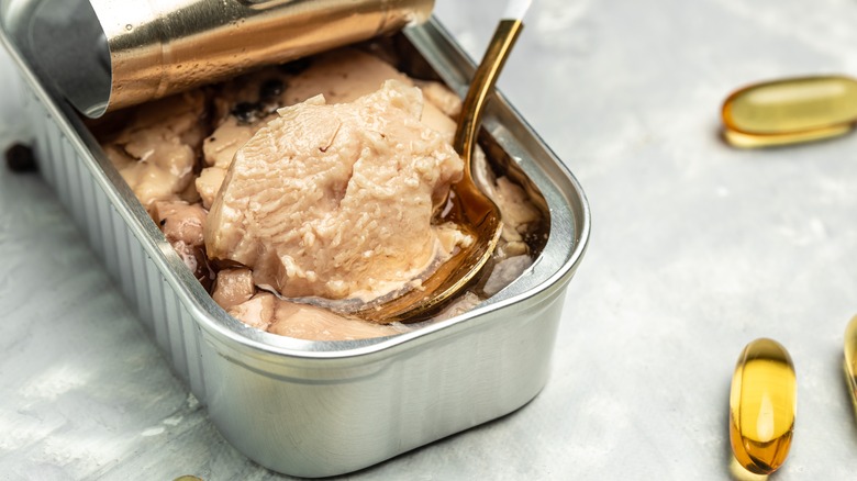 Canned cod with oil capsules