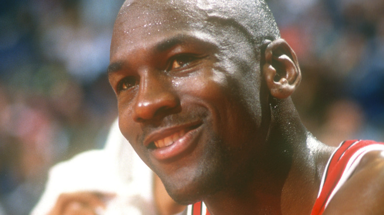 Michael Jordan smiling courtside