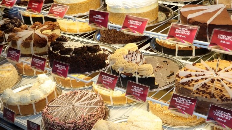 An array of Cheesecake Factory cheesecakes on display