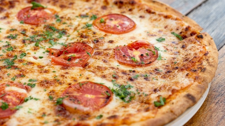 Golden brown Margherita pizza