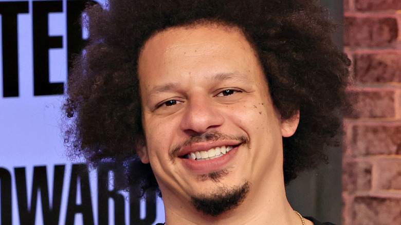 Eric André smiling