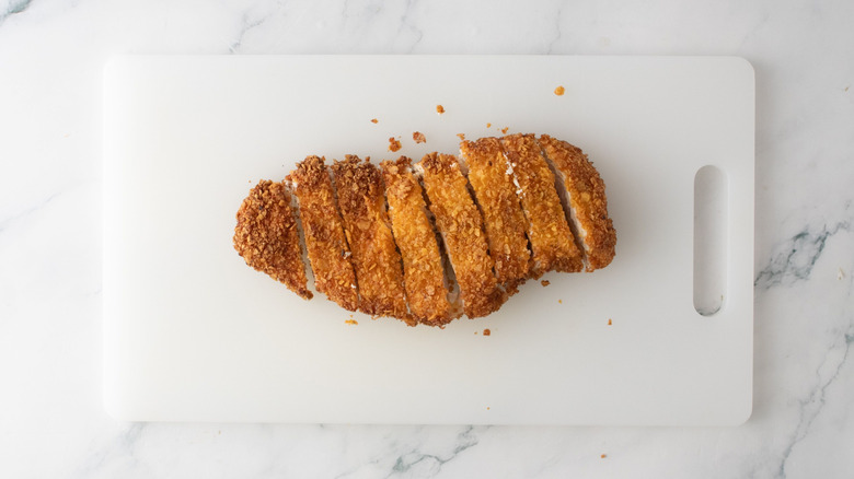Fried chicken cutlet sliced into strips
