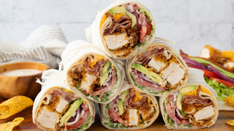 Halved chicken bacon ranch wraps stacked into a pyramid