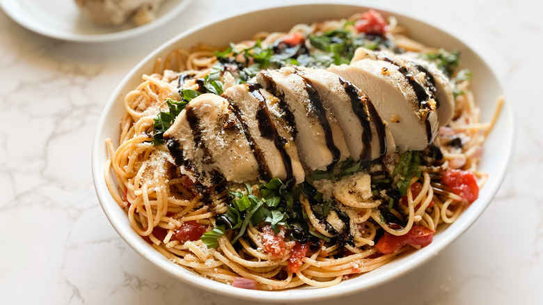 Chicken bruschetta pasta dish closeup 