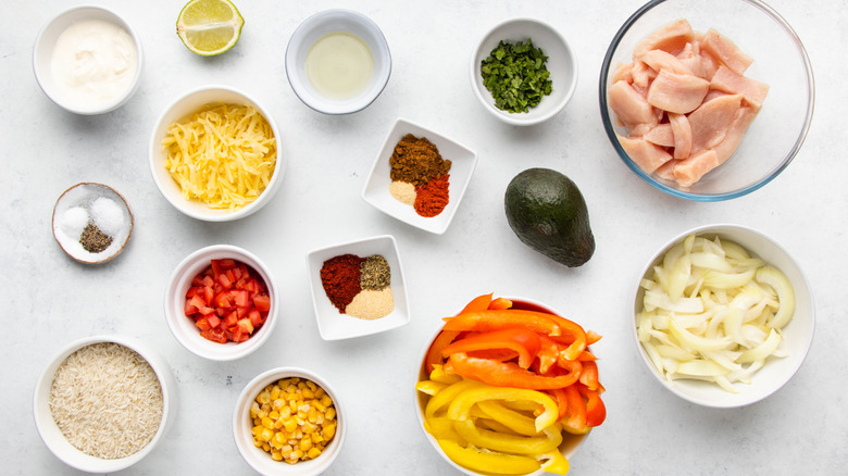 Loaded chicken fajita bowl ingredients laid out