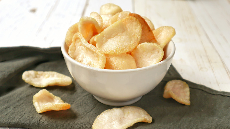 white bowl of crispy prawn crackers