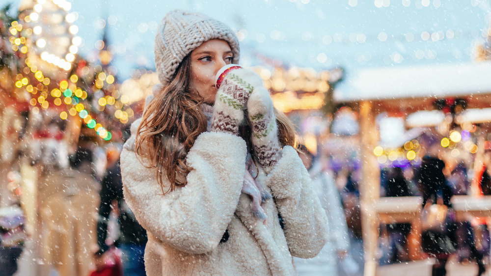 Woman drinking something