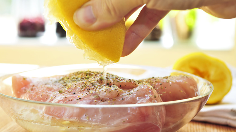 raw chicken with lemon