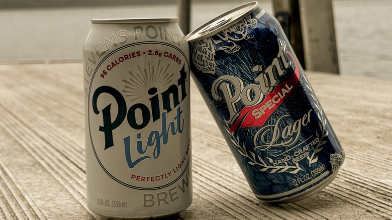 Can of regular and light Point Special lager on dock.