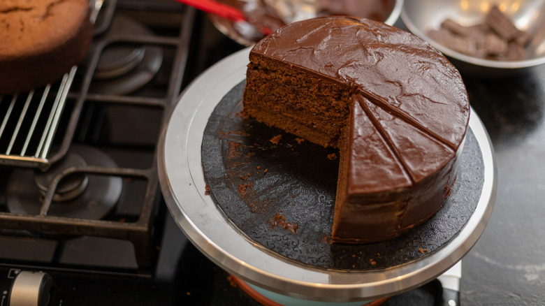 Seven-layer chocolate cake slices on a cake stand