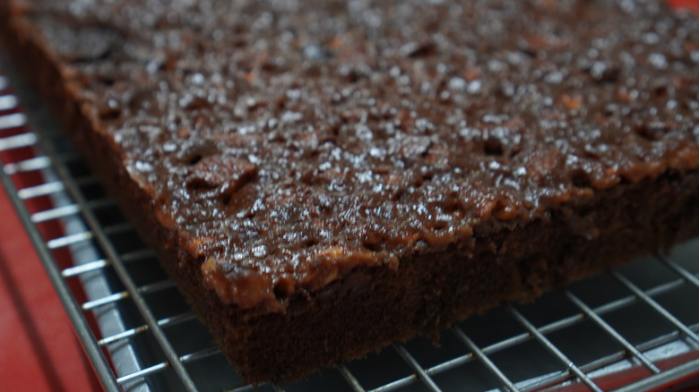 Clove cake cooling on a rack