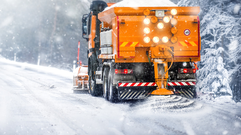 Salt truck on a road in winter