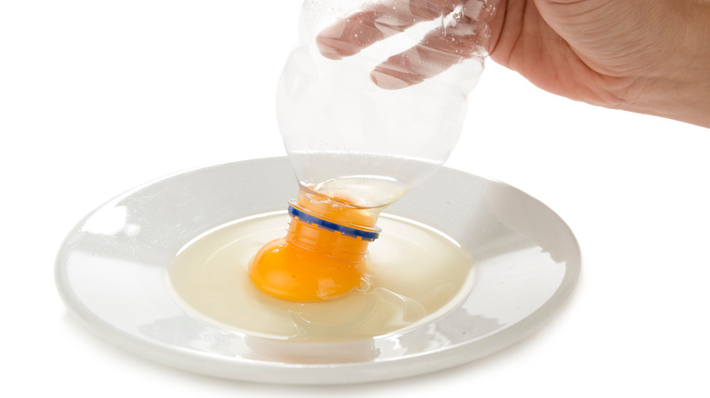 The Clever Trick For Separating Egg Yolks And Whites With A Water Bottle