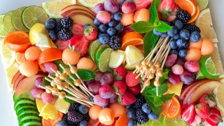 A board with a mix of fruits