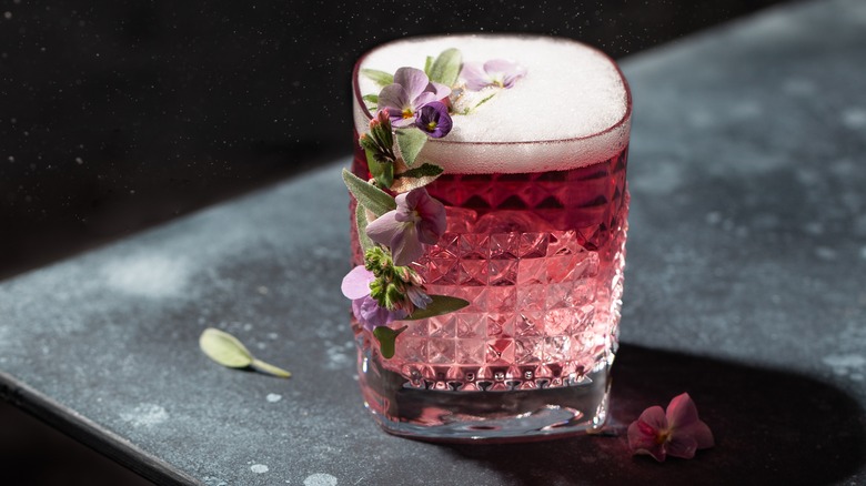 Pink cocktail with flowers