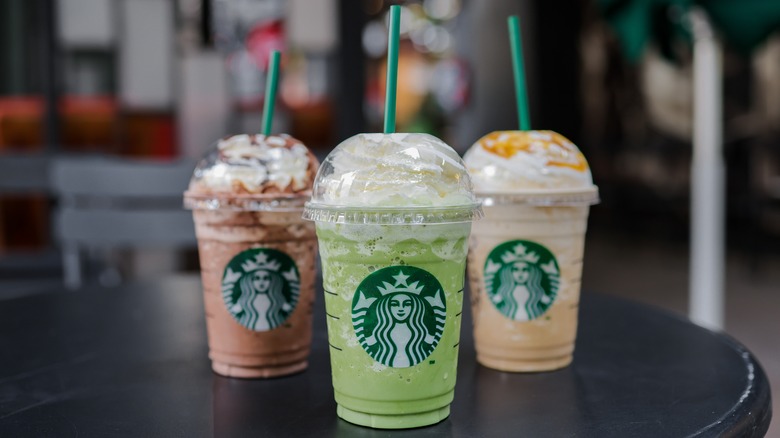 Starbucks Frappucinos on a counter