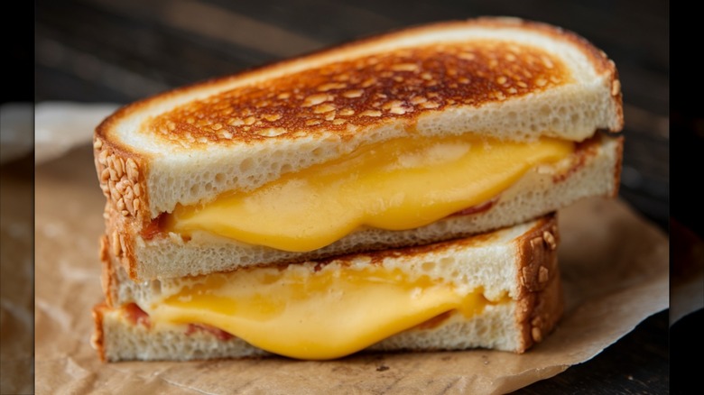 closeup of gooey grilled cheese sandwich